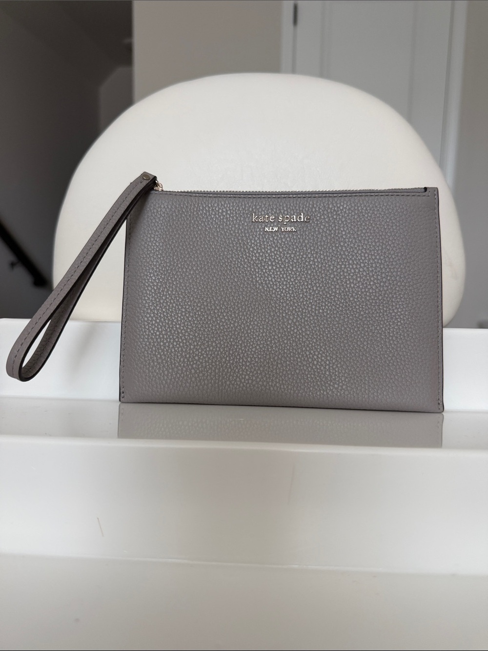 kate spade gray pebbled leather wristlet clutch